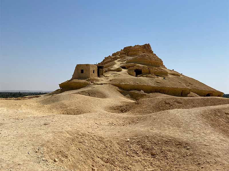 Oracle of Amun and 15 Unique Attractions in Siwa Oasis Desert hill and archaeological landscape around Gebel al-Mawta