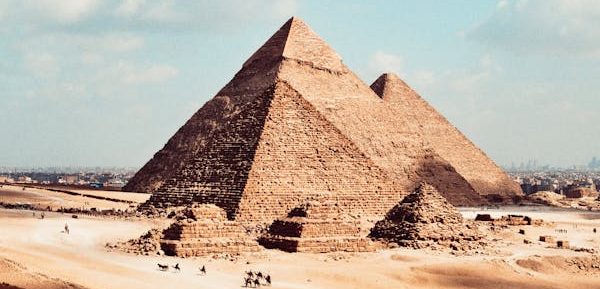 Pyramids of Giza rising above the desert plateau