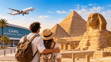 Young couple exploring the Giza Pyramids and Great Sphinx after arriving at Cairo International Airport.